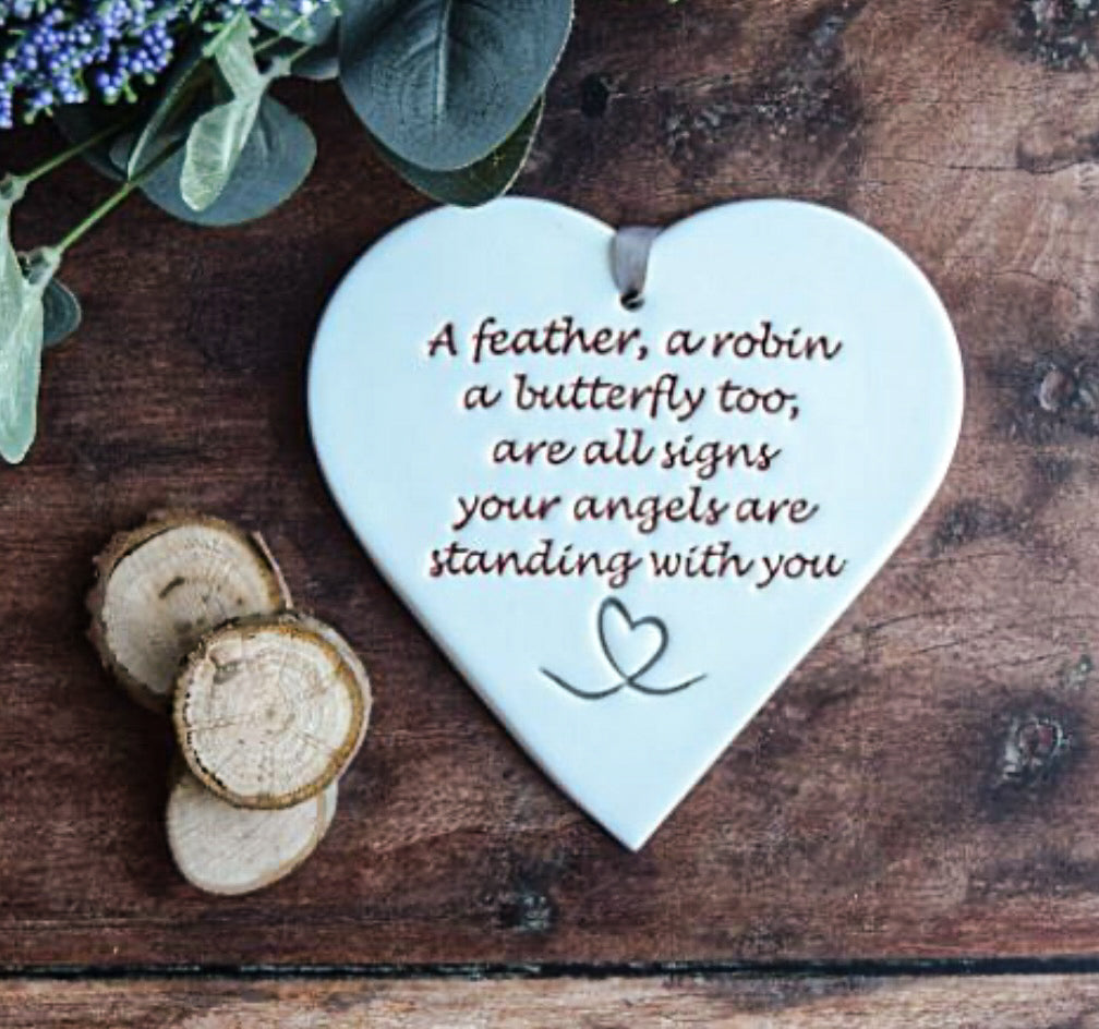 Angels Ceramic Gift tag, with the text "a feather, a robin, a butterfly too, are all signs your angels are standing with you" surrounded by foliage