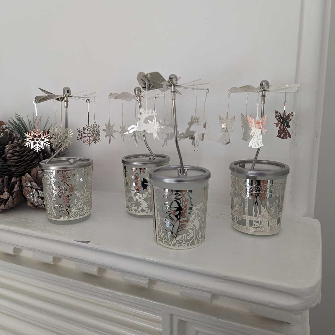 Our collection of silver Christmas Carousels