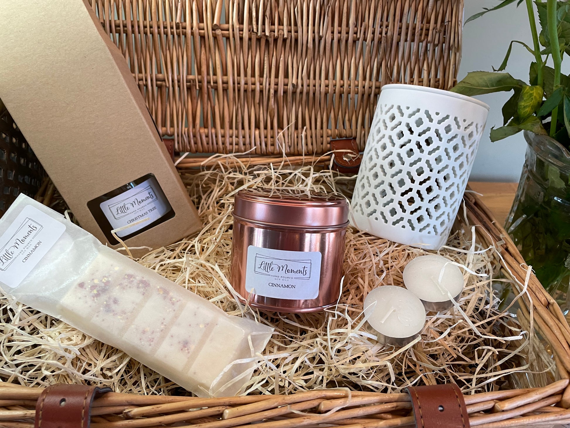 luxury wicker gift hamper with a reed diffuser 20cl fragrance candle in rose gold tin, wax melt snap bar and a dragonfly ceramic wax melt burner