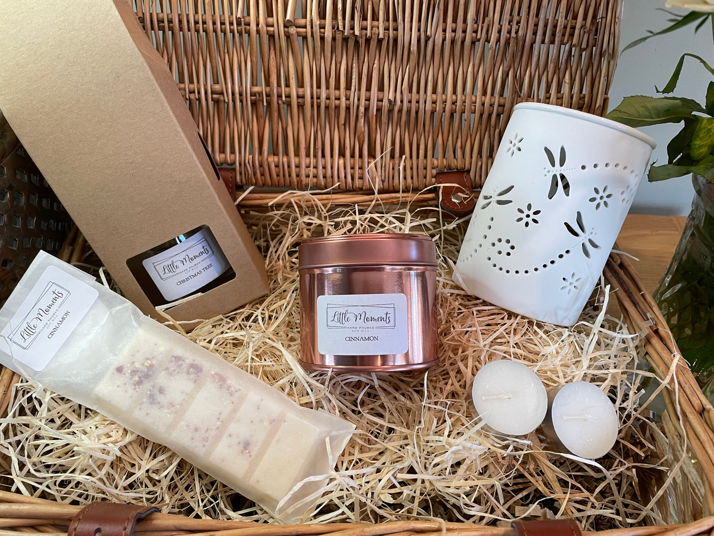 luxury wicker gift hamper with a reed diffuser 20cl fragrance candle in rose gold tin, wax melt snap bar and a dragonfly ceramic wax melt burner