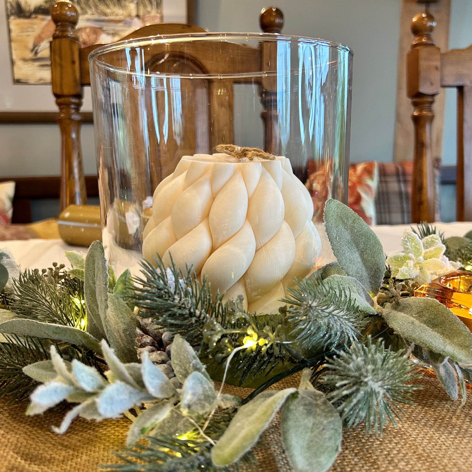 Large braid knot candle made with soy wax, styled as a home centerpiece