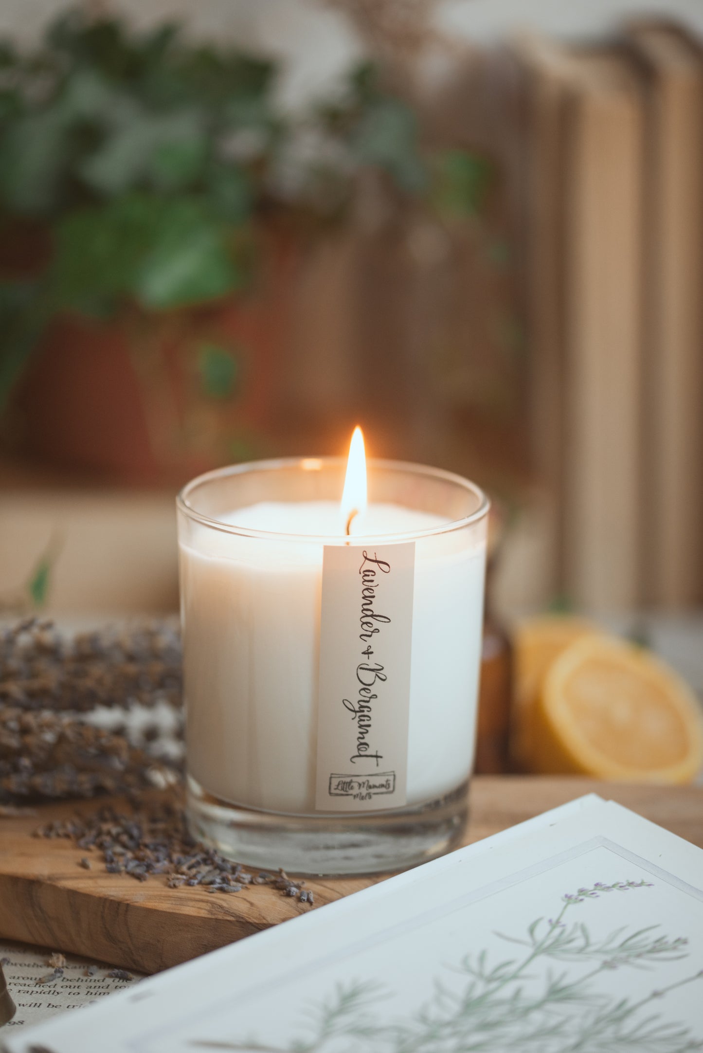 lit candle with the text lavender and bergamot on the label 