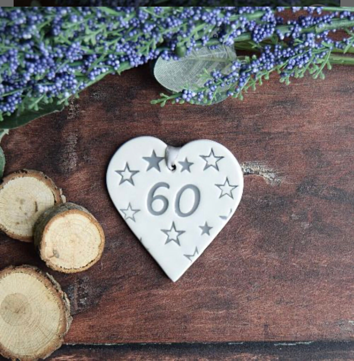 Ceramic gift tag, with the text "60", surrounded by stars 