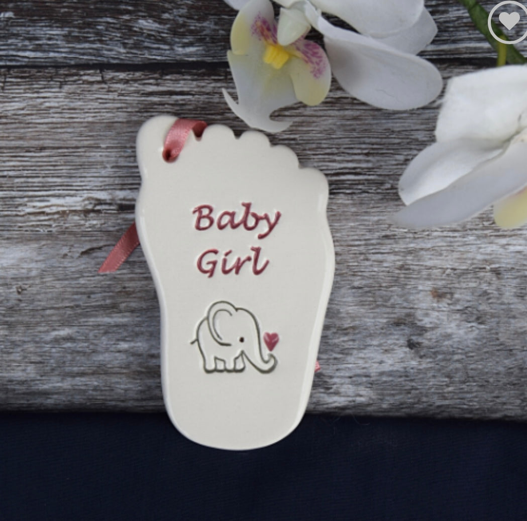 Ceramic tag in the shape of a babies foot with the words "baby girl" and elephant drawing , a perfect  gift for a baby shower