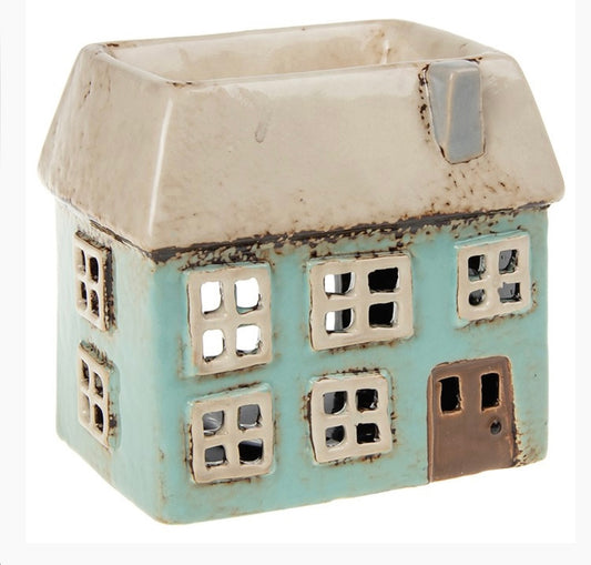 Aqua oblong house wax burner with cream coloured roof with pool for wax melts. windows are cutout shapes 