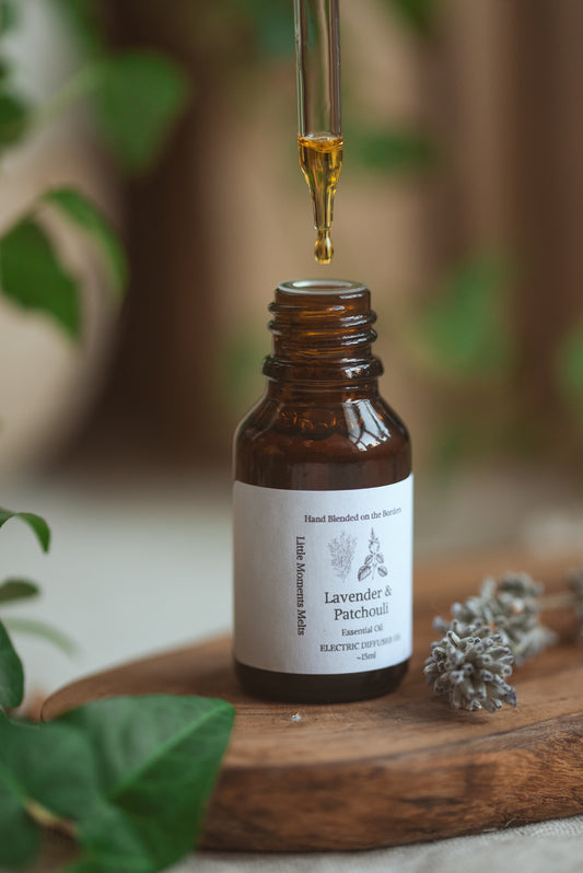 Brown droplet bottle with lavender in the picture 