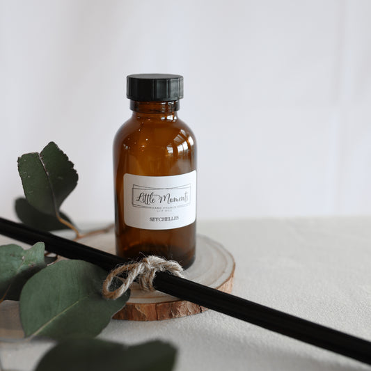 Reed diffuser refill in brown bottle  and reeds
