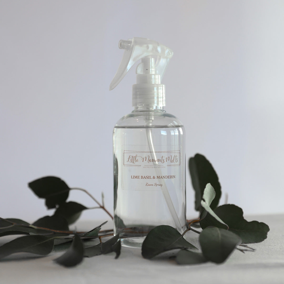 1 x 200ml bottle of room spray in various fragrances with foliage surrounding