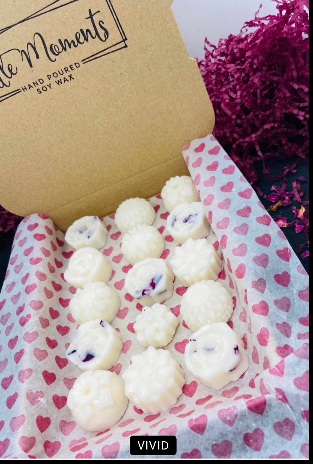 postal box of hand poured soy wax melts in the shape of various flowers available in a wide range of fragrances