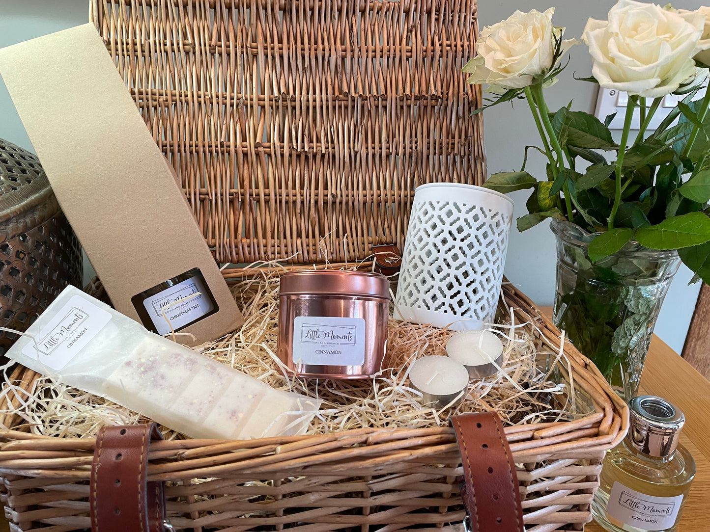 luxury wicker gift hamper with a reed diffuser 20cl fragrance candle in rose gold tin, wax melt snap bar and a dragonfly ceramic wax melt burner