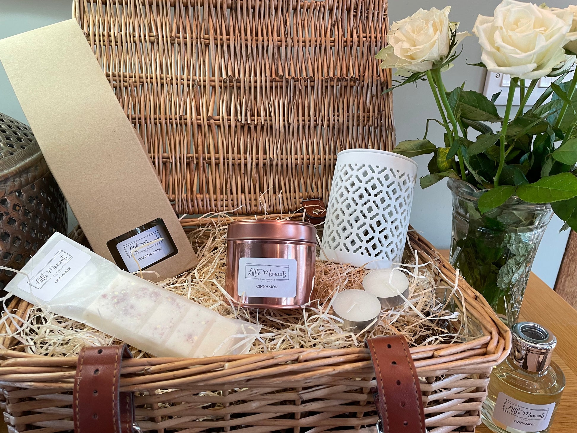 luxury wicker gift hamper with a reed diffuser 20cl fragrance candle in rose gold tin, wax melt snap bar and a dragonfly ceramic wax melt burner
