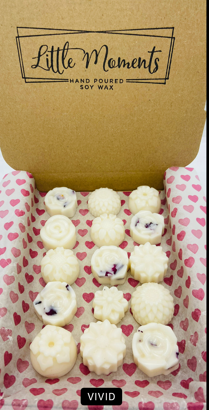 postal box of hand poured soy wax melts in the shape of various flowers available in a wide range of fragrances