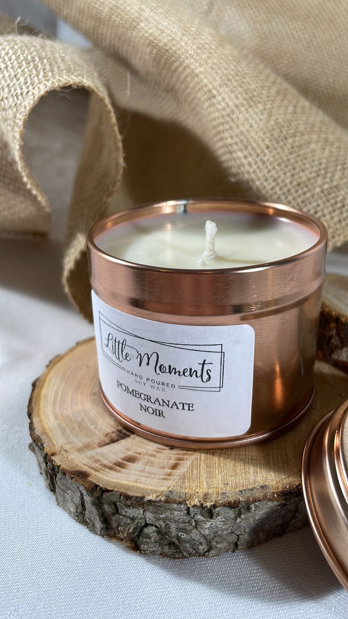 Open tin candle