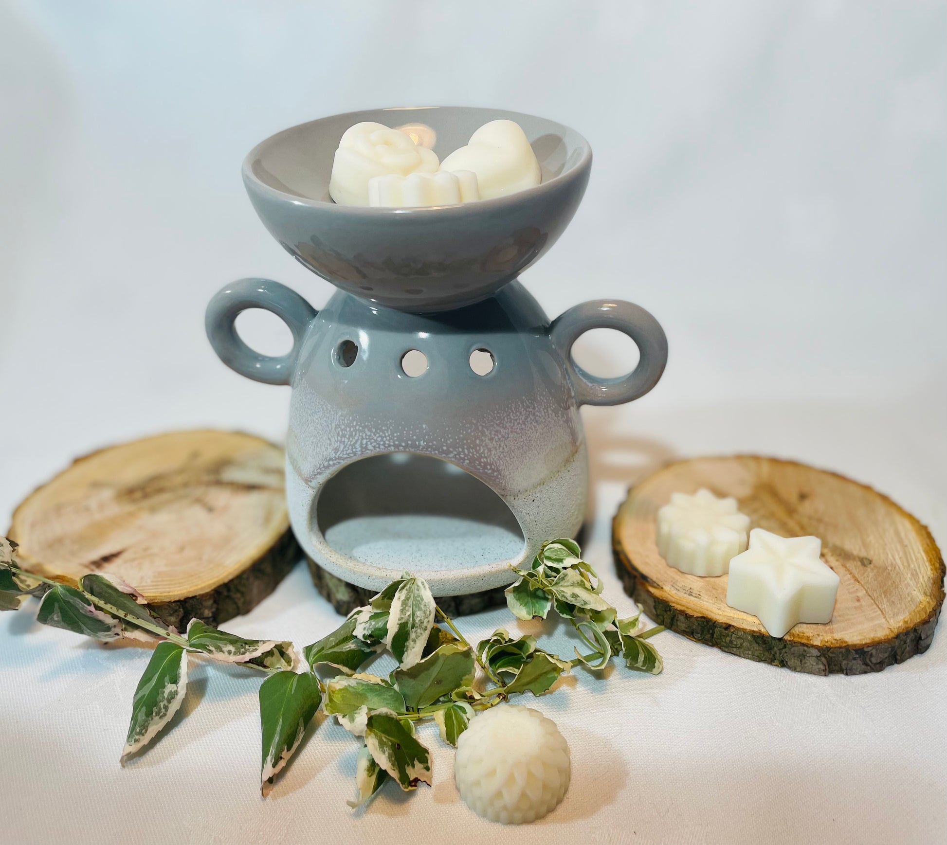 cute grey toned wax melt burner in a gift set with individual soy wax melts